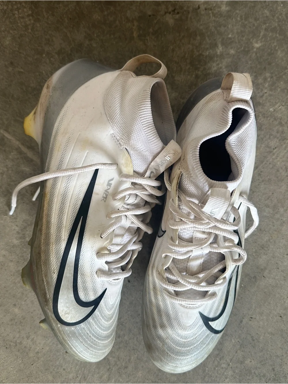 Nike White and Black Soccer Cleats with Yellow Stud Accents